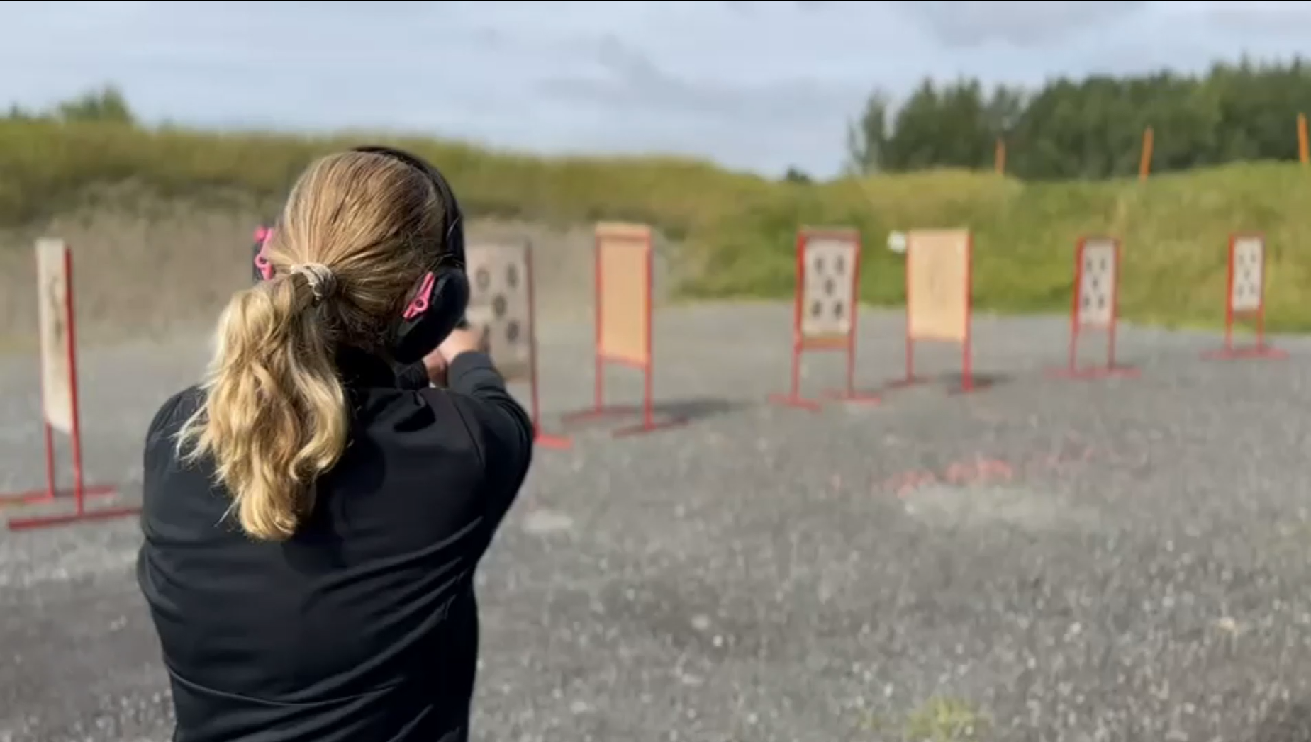 A woman at the firing range
