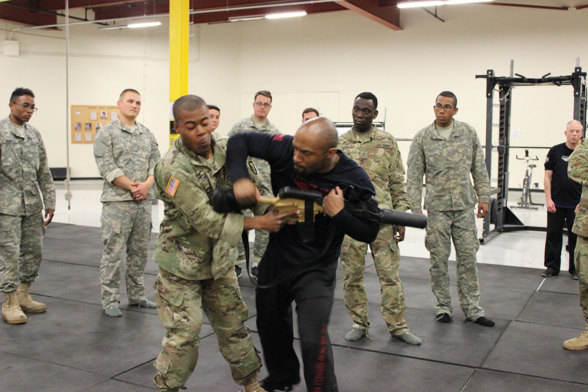 Military men training with krav maga instructor