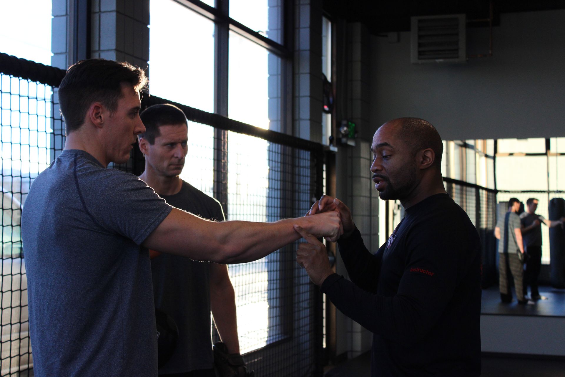 men at a krav maga studio
