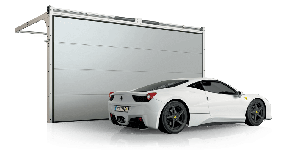 A white sports car is parked in front of a garage door.