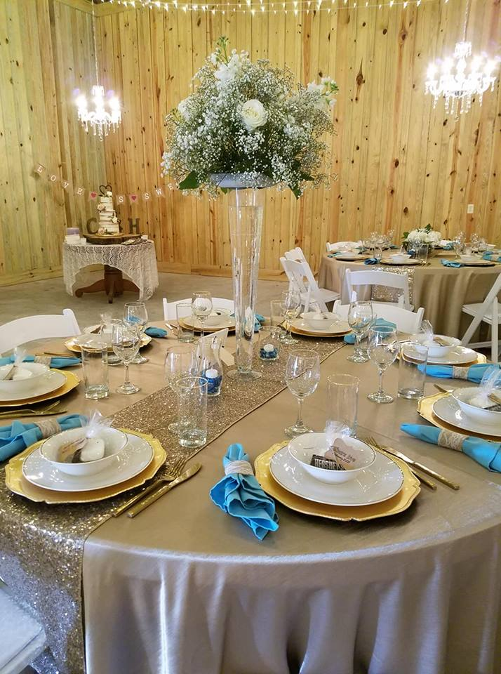Arrangement of White Tables and Chairs — Indoor Venue in Webster, FL