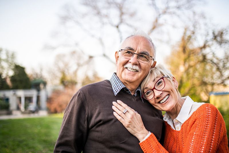 A woman and man in a park. Regenerative therapy can help with COPD, chronic knee, back, neck, hip, shoulder pain, osteoarthritis, arthritis, and other joint pain.