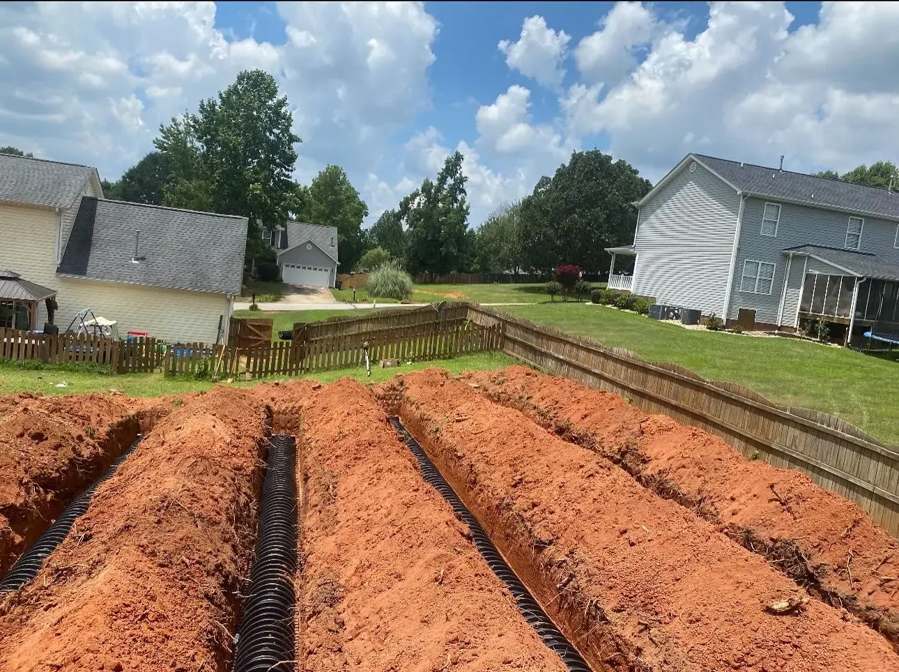 An aerial view of a large wave in the ocean.