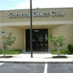 The front of a building with a sign that says sarabay dance club.
