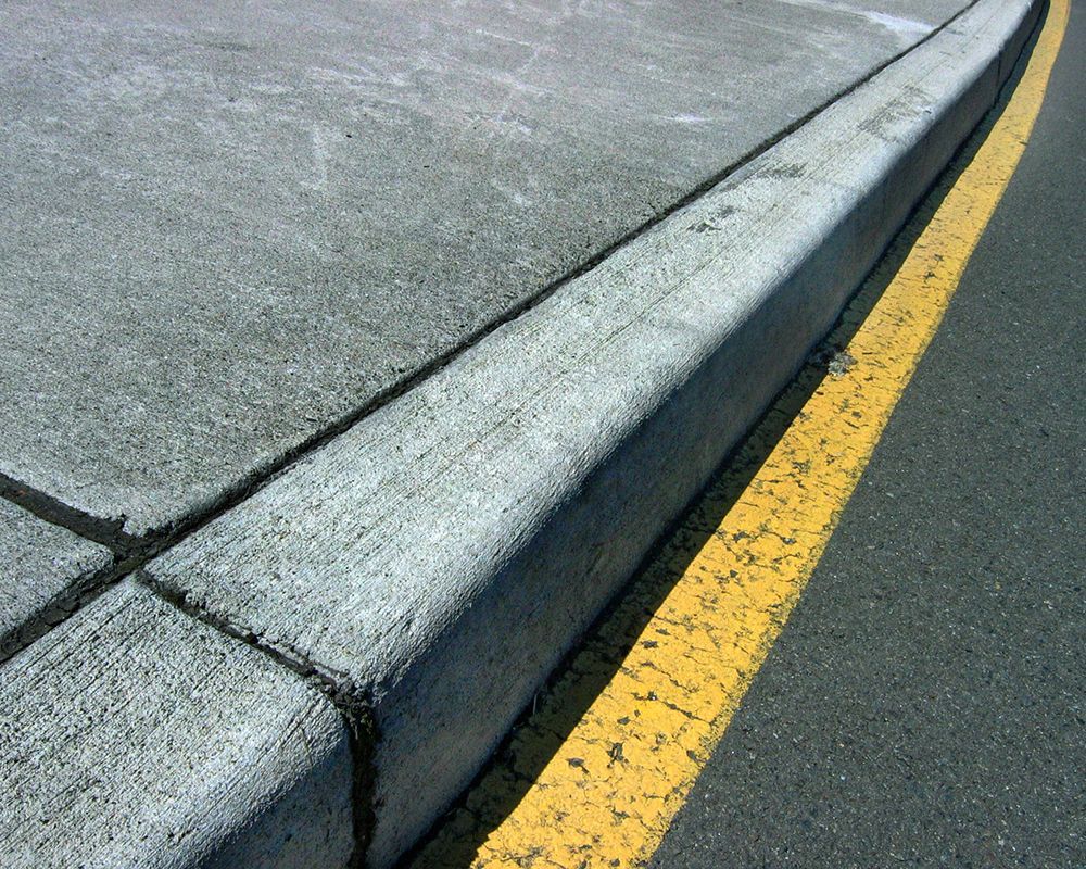 Sidewalk Curb – Oahu, HI – Oahu Sealcoating & Paving