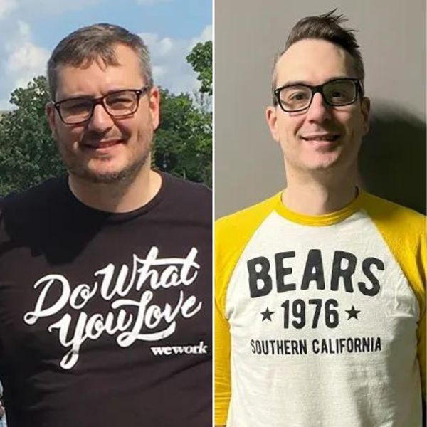 Two men wearing glasses, one in a black