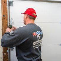 Worker Repairs the Garage Door — Antioch, IL — Duke of Doors