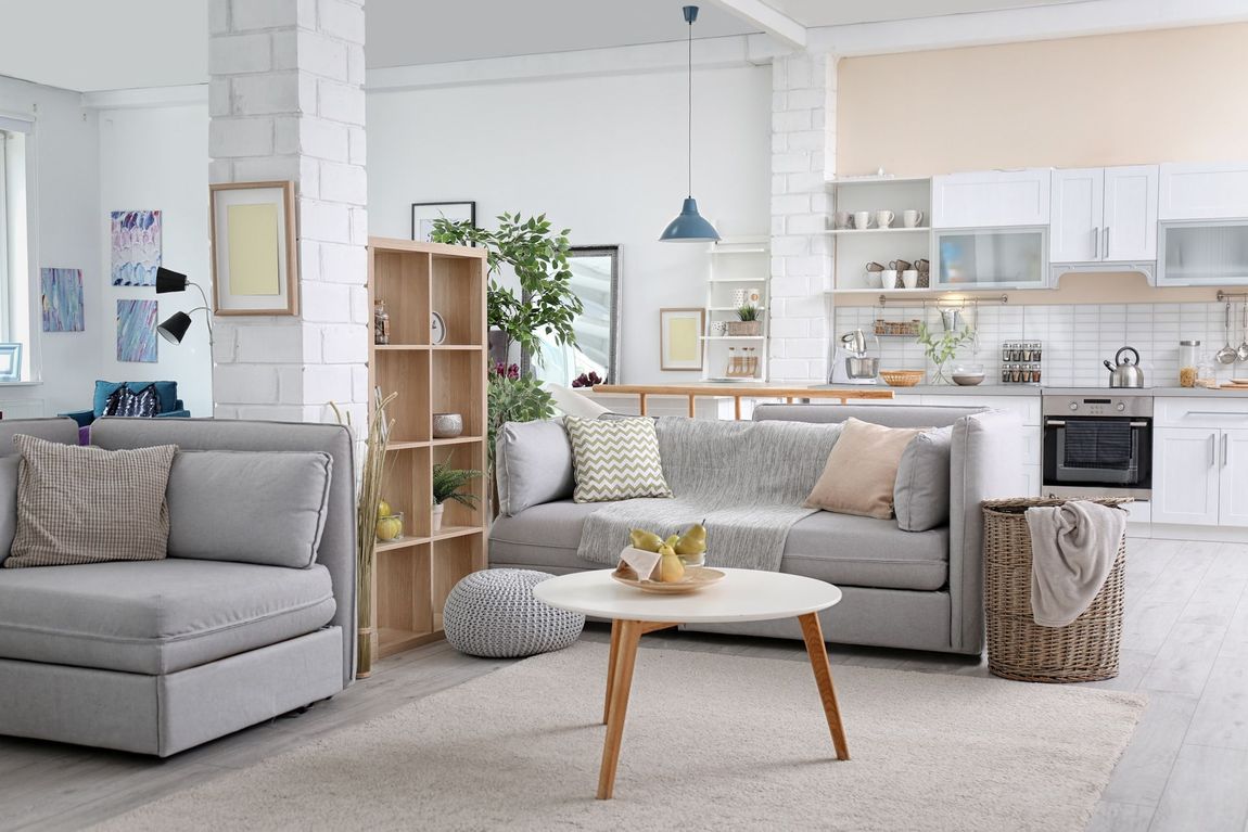 A living room with a couch and a coffee table.
