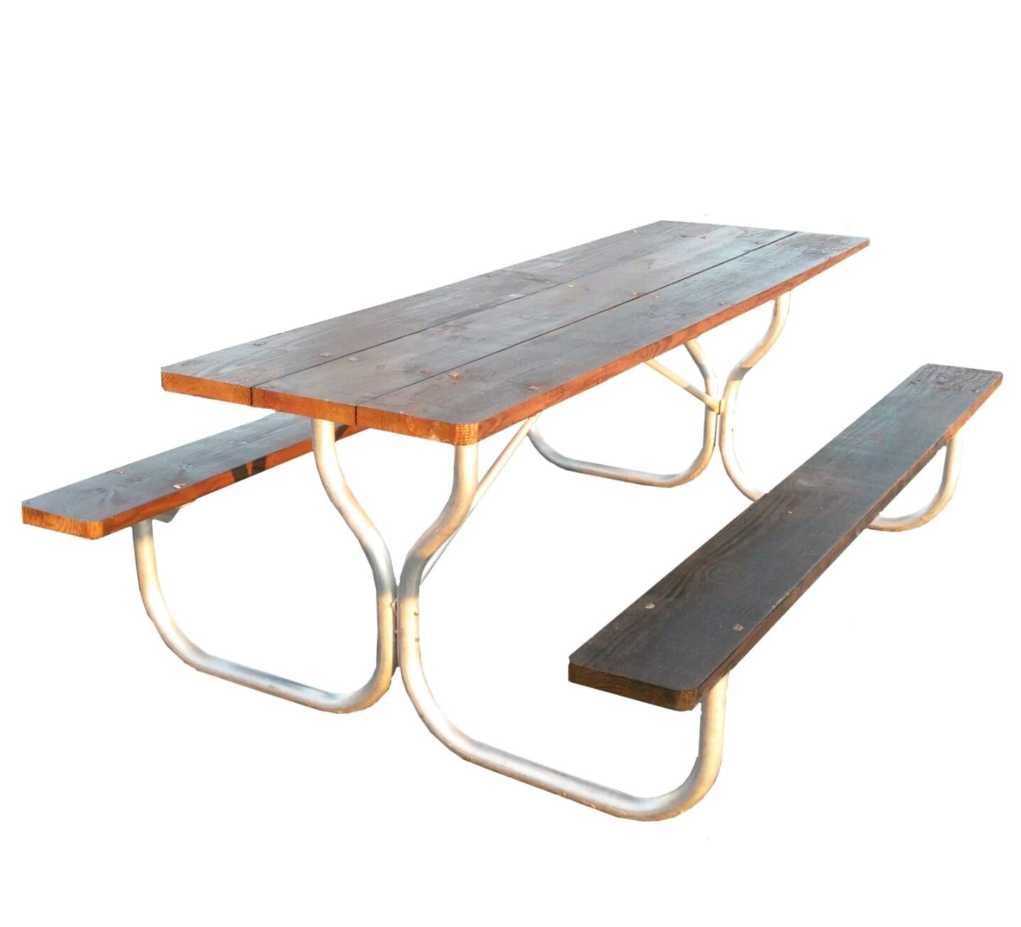Picnic table with wooden tabletop and benches, supported by a curved, silver metal frame.