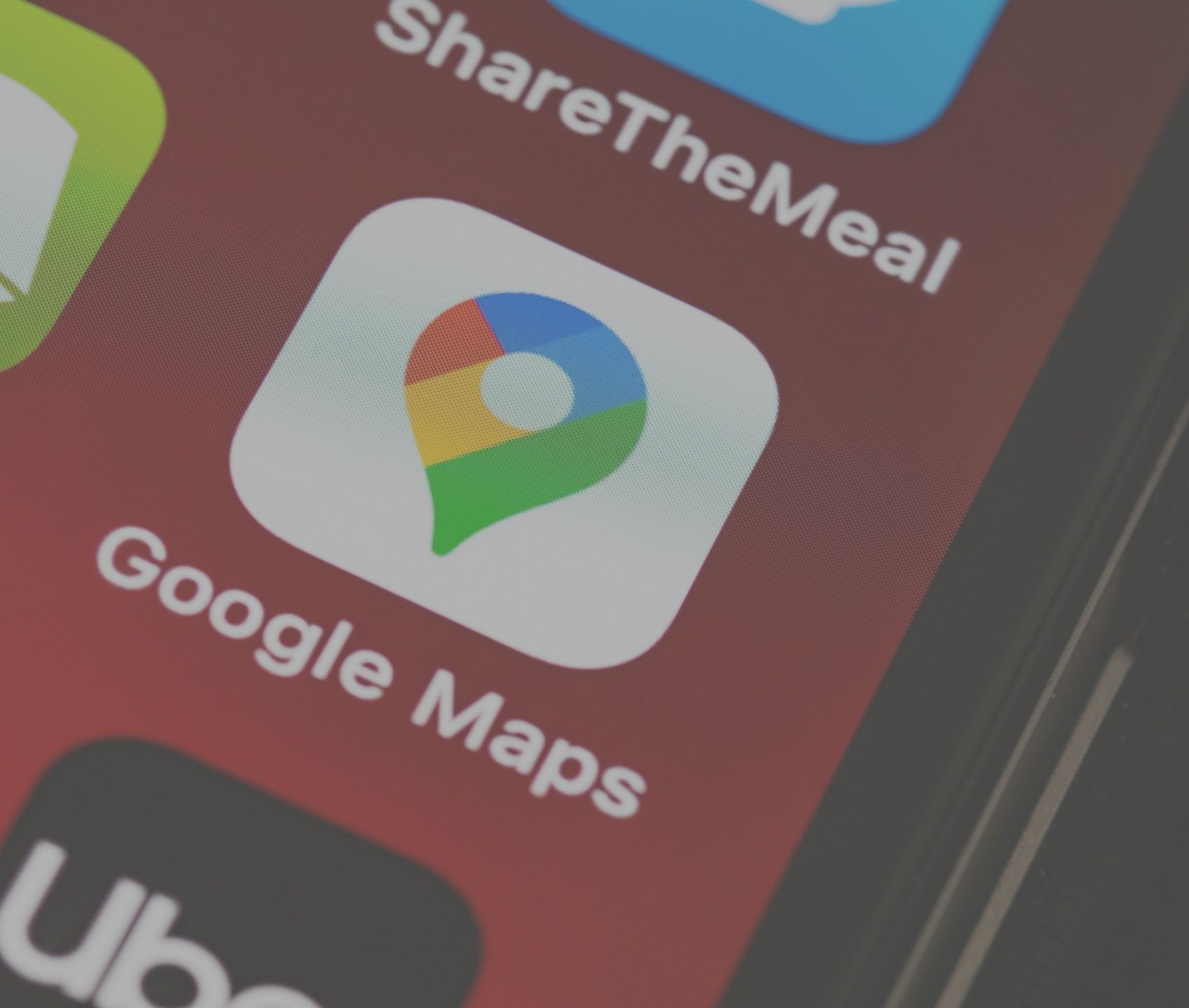 A laptop computer is open to a facebook page.