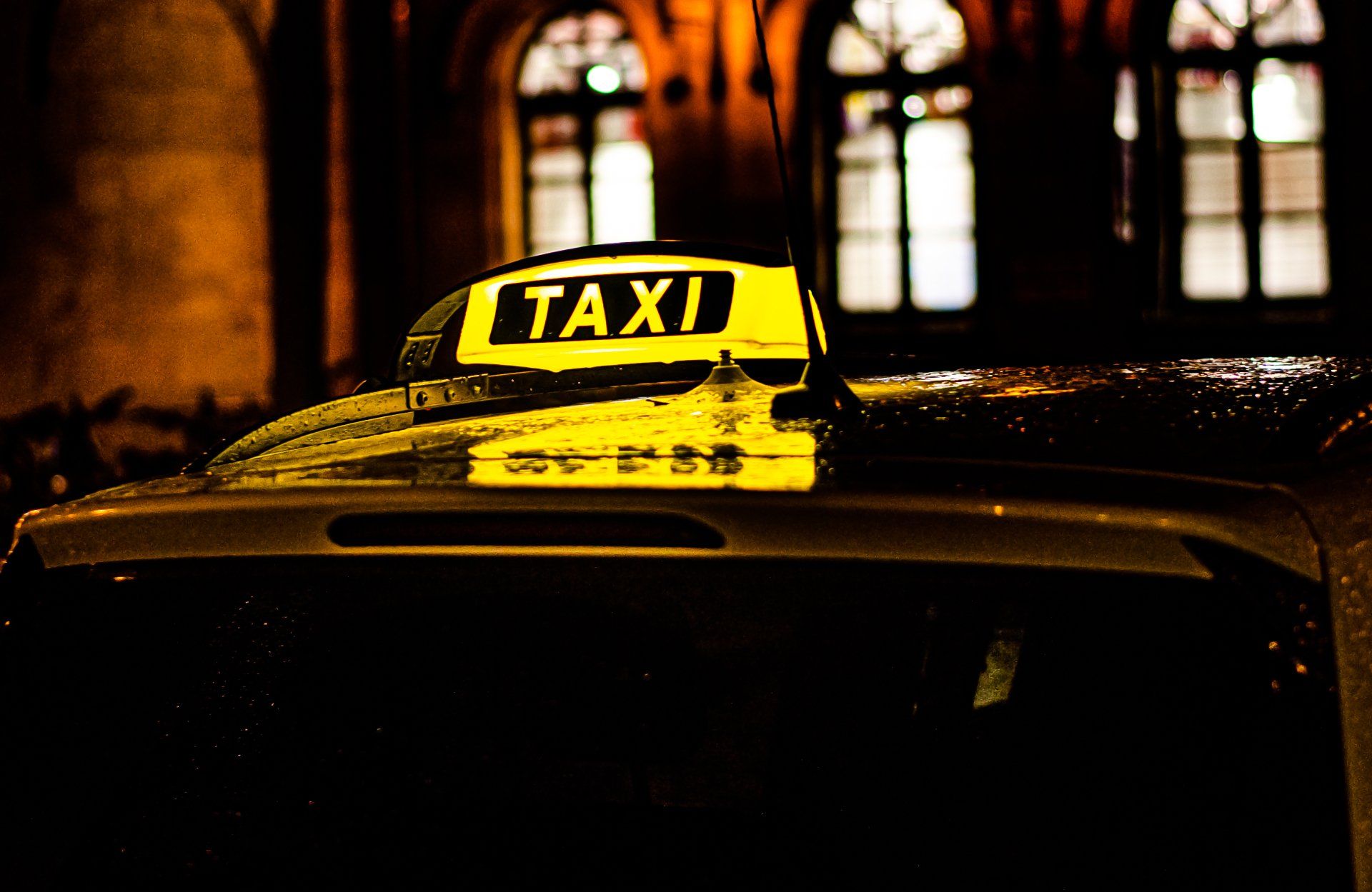 taxi car on the street at night