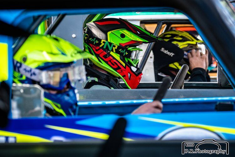 A person wearing a helmet that says just on it