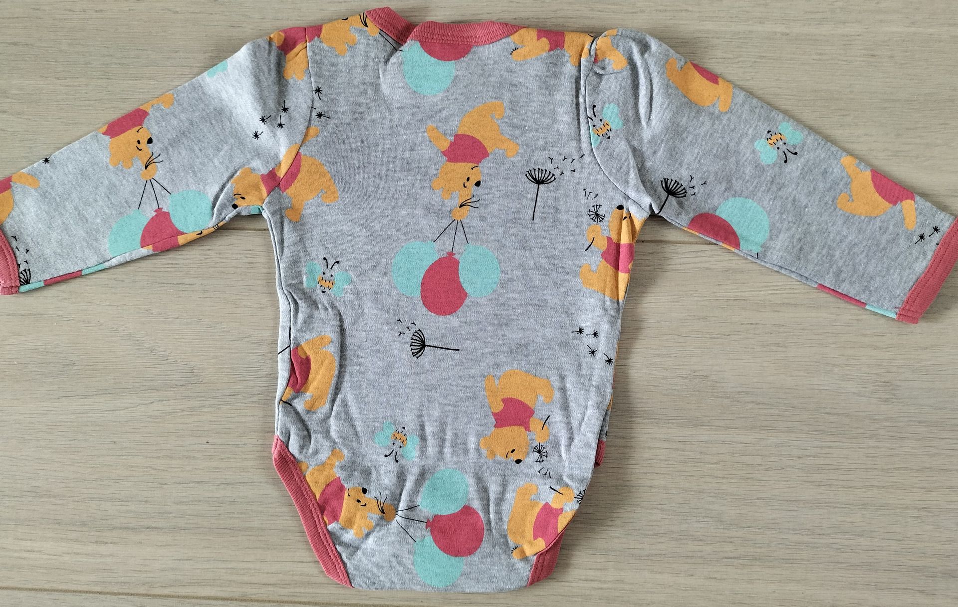 Disney Winnie the Pooh romper grijs maat 62-68