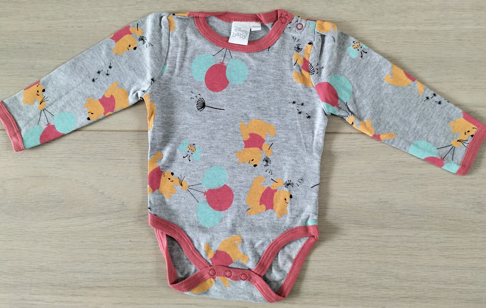 Disney Winnie the Pooh romper grijs maat 62-68