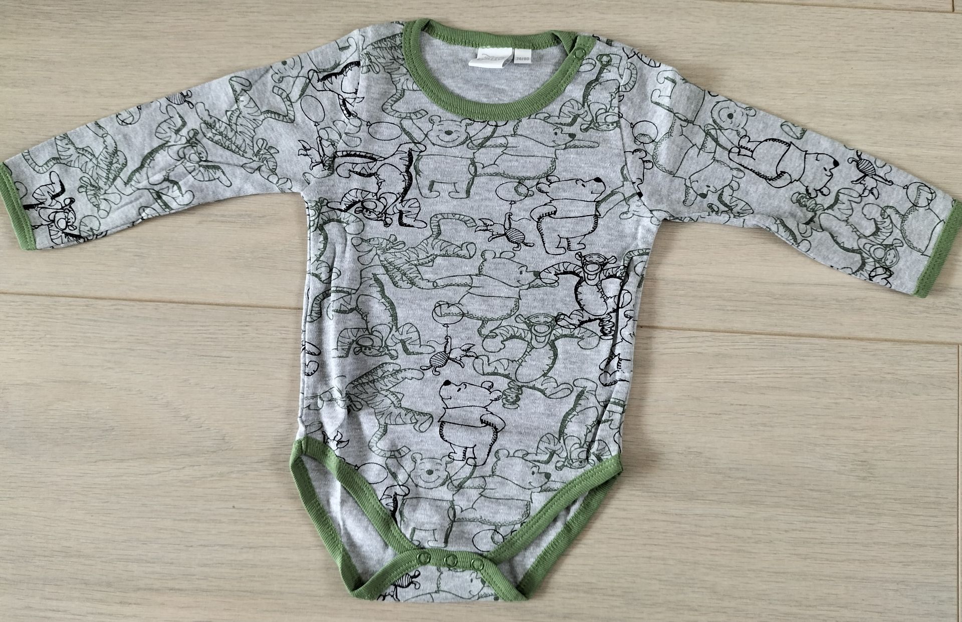 Disney Winnie the Pooh romper grijs maat 74-80