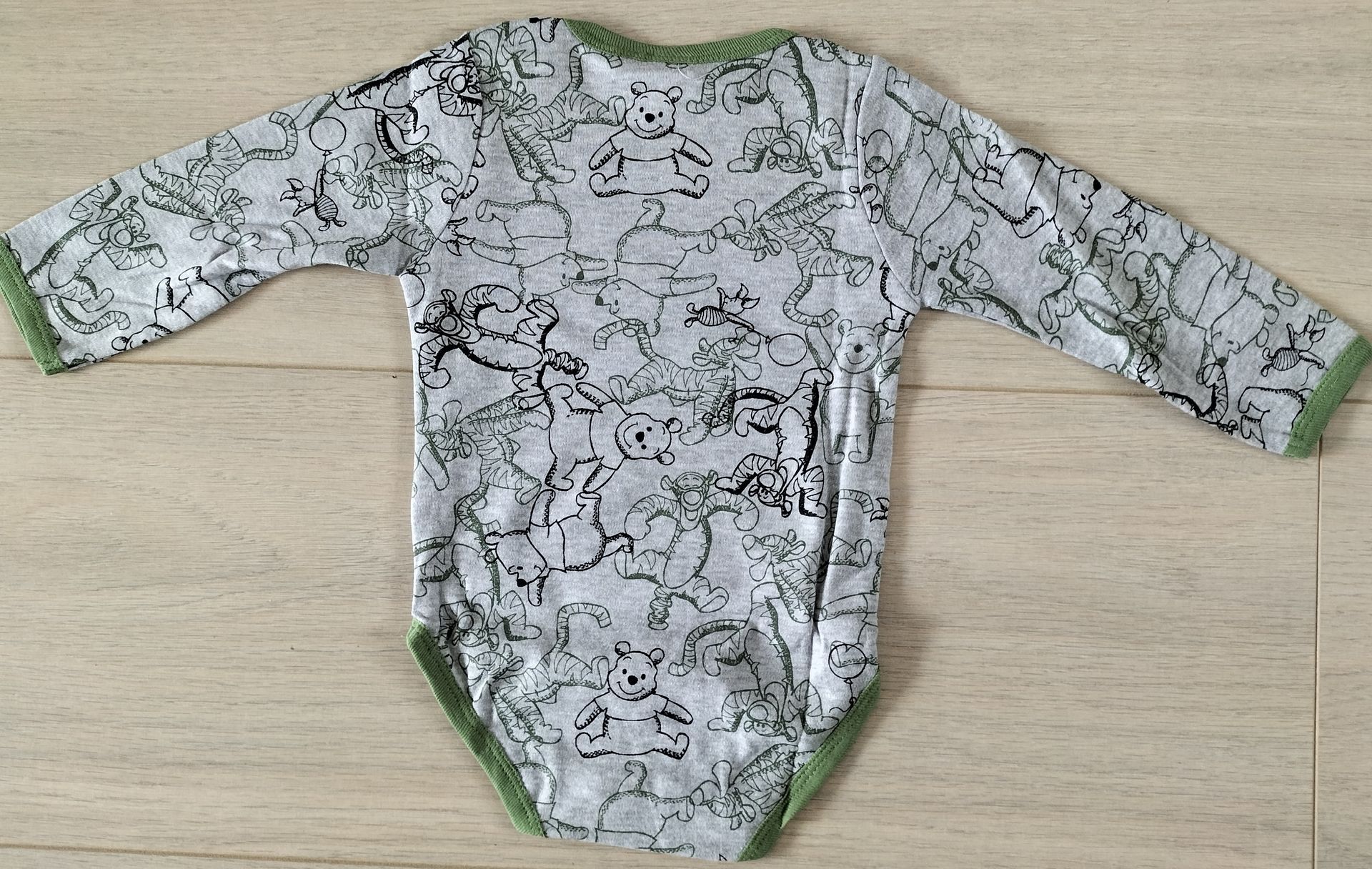 Disney Winnie the Pooh romper grijs maat 74-80