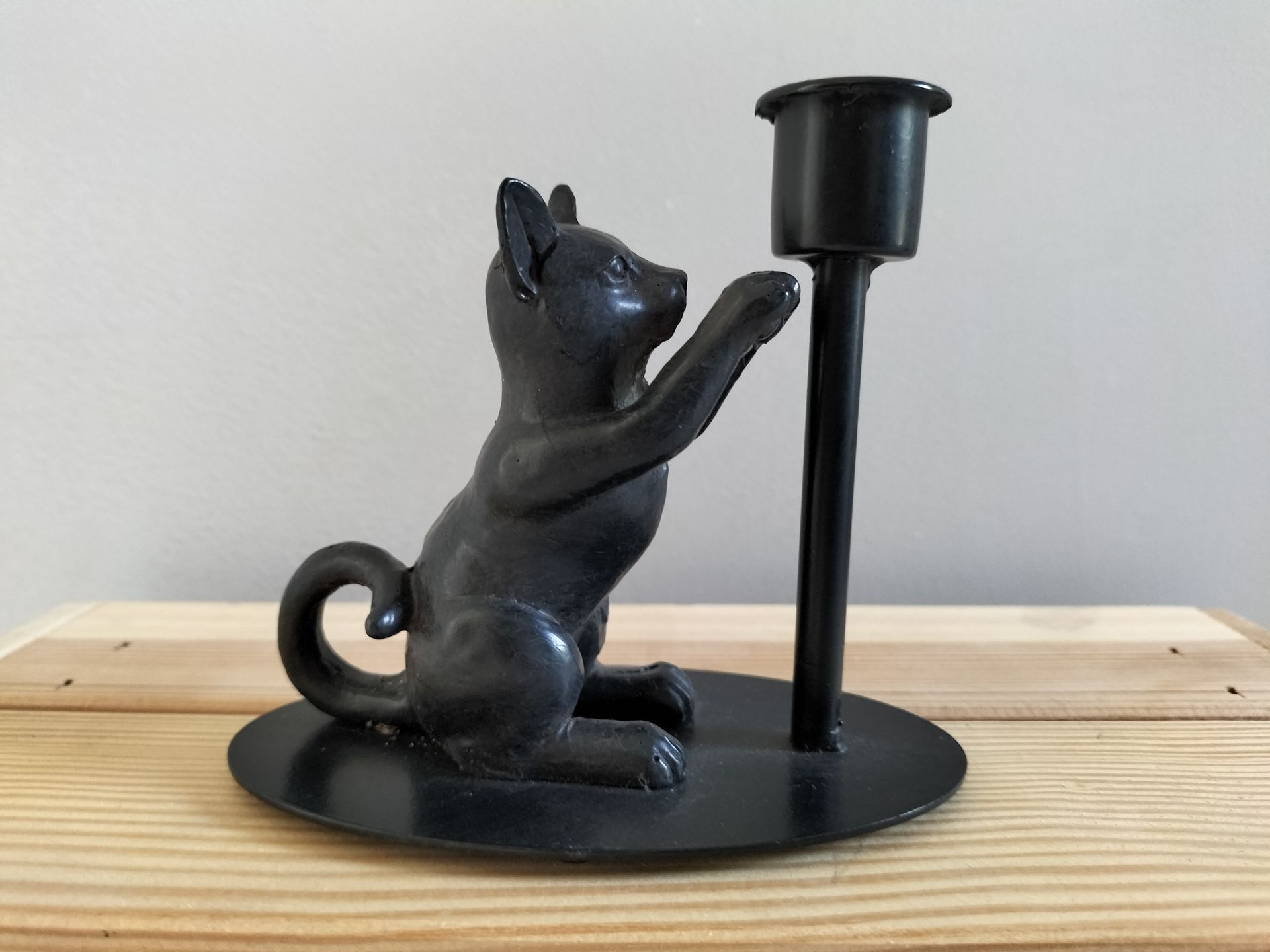 Kandelaar kat zittend