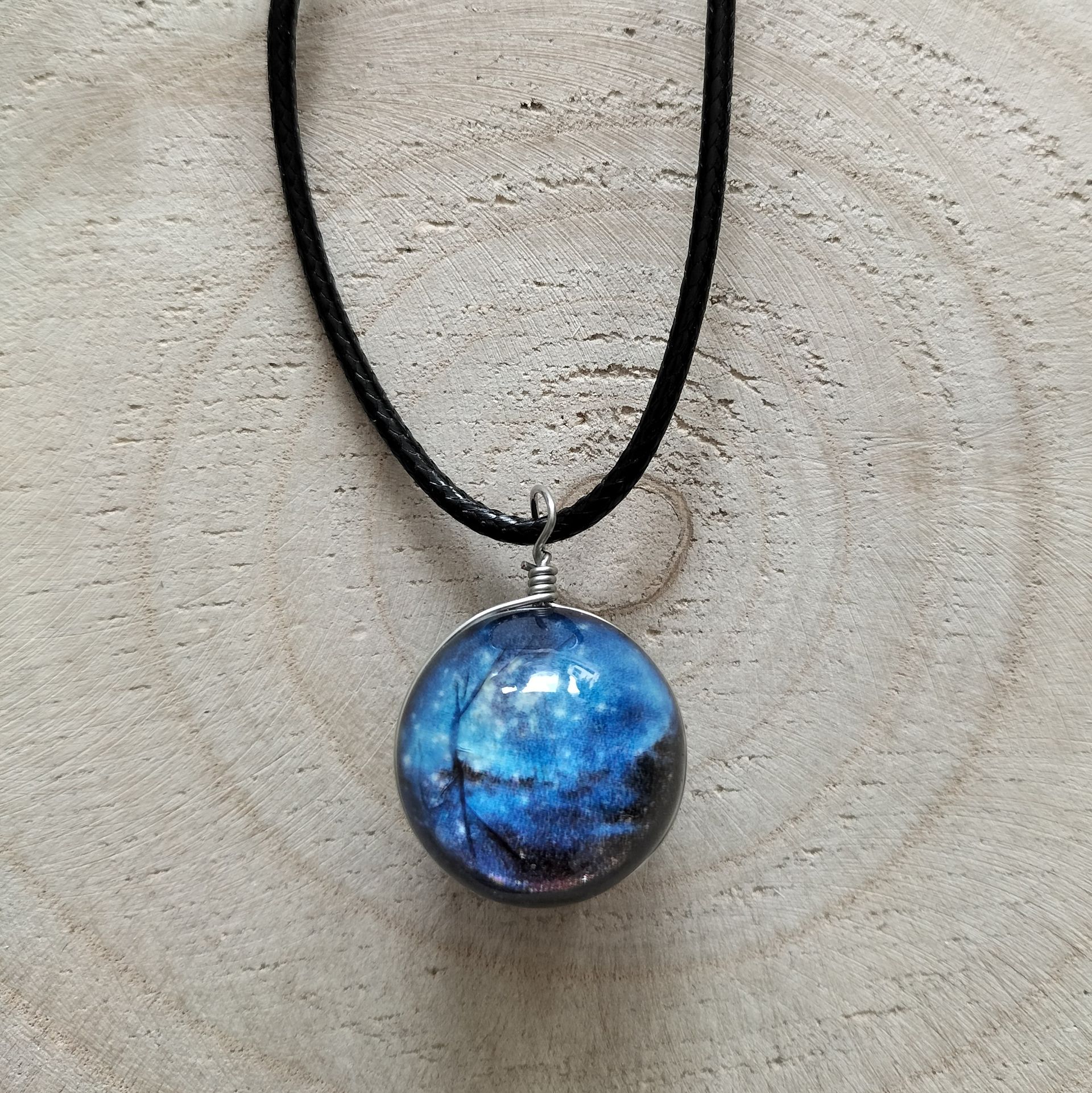 Waxkoord ketting met blauwe universum bol