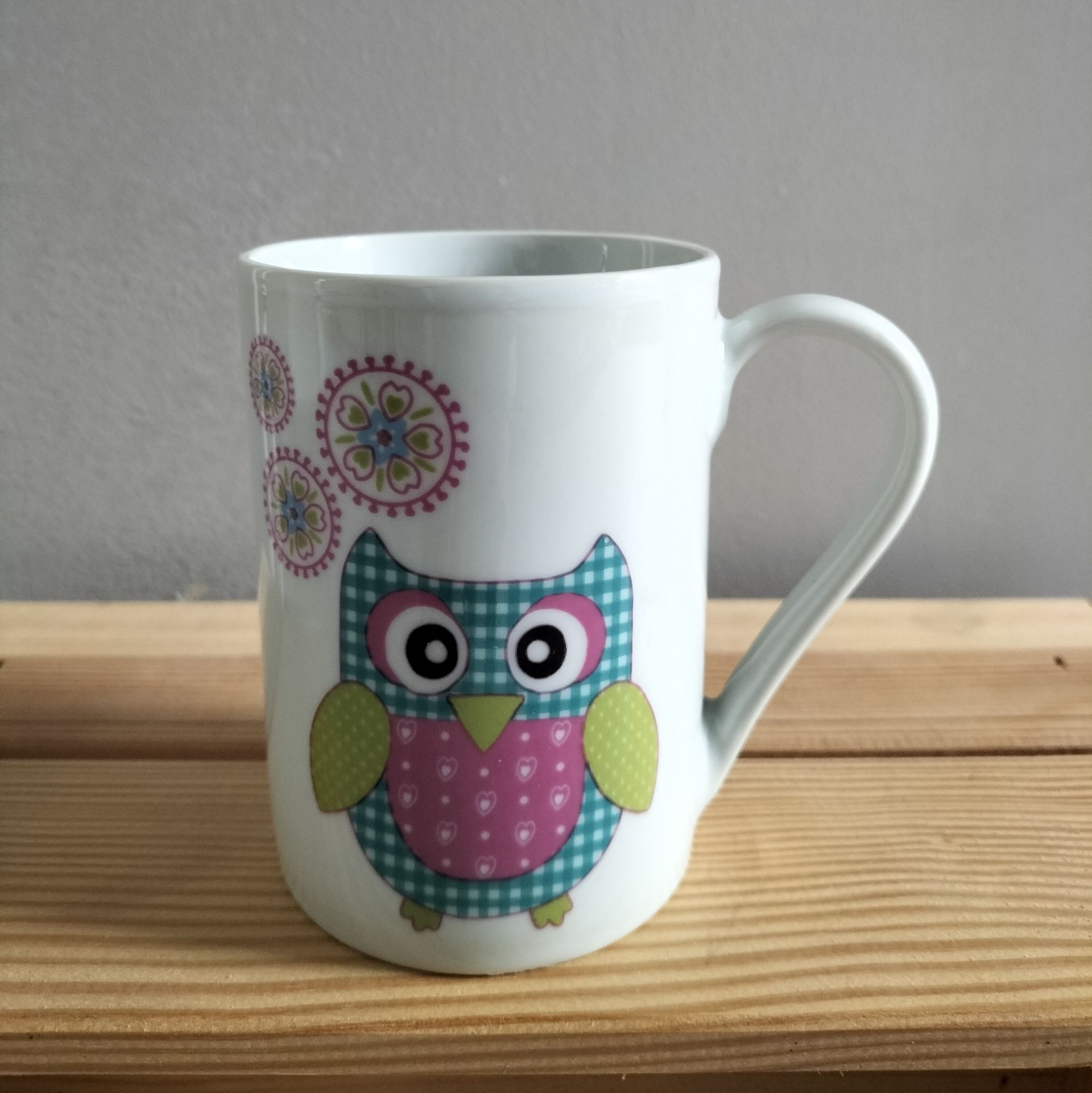 Mok met uil motief