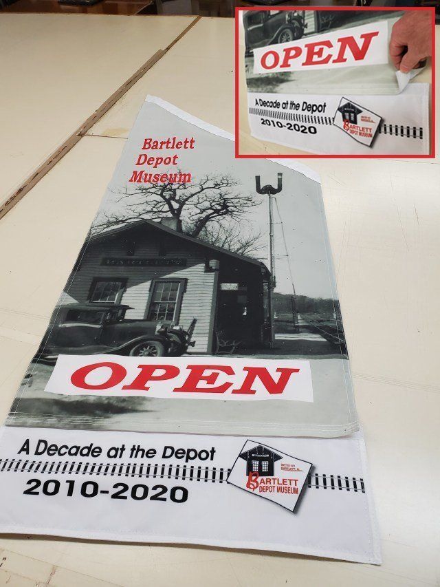 A opening banner printed with black and white color