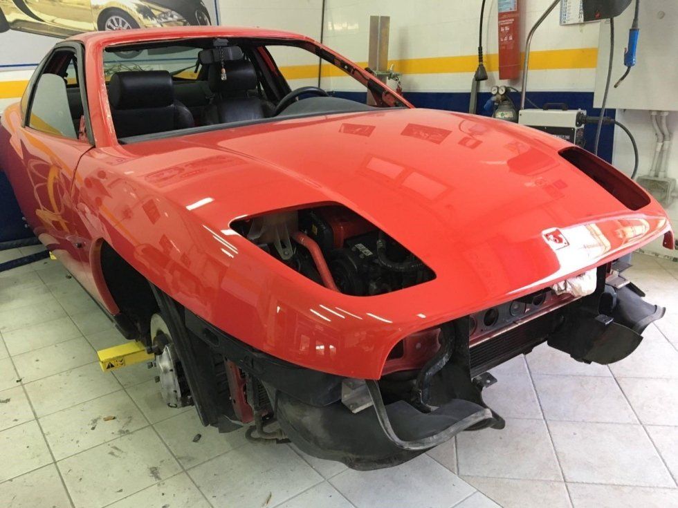 fiat coupe rossa appena verniciata
