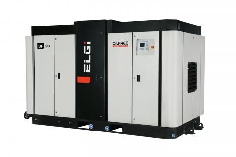 A large air compressor is sitting on top of a pallet on a white background.