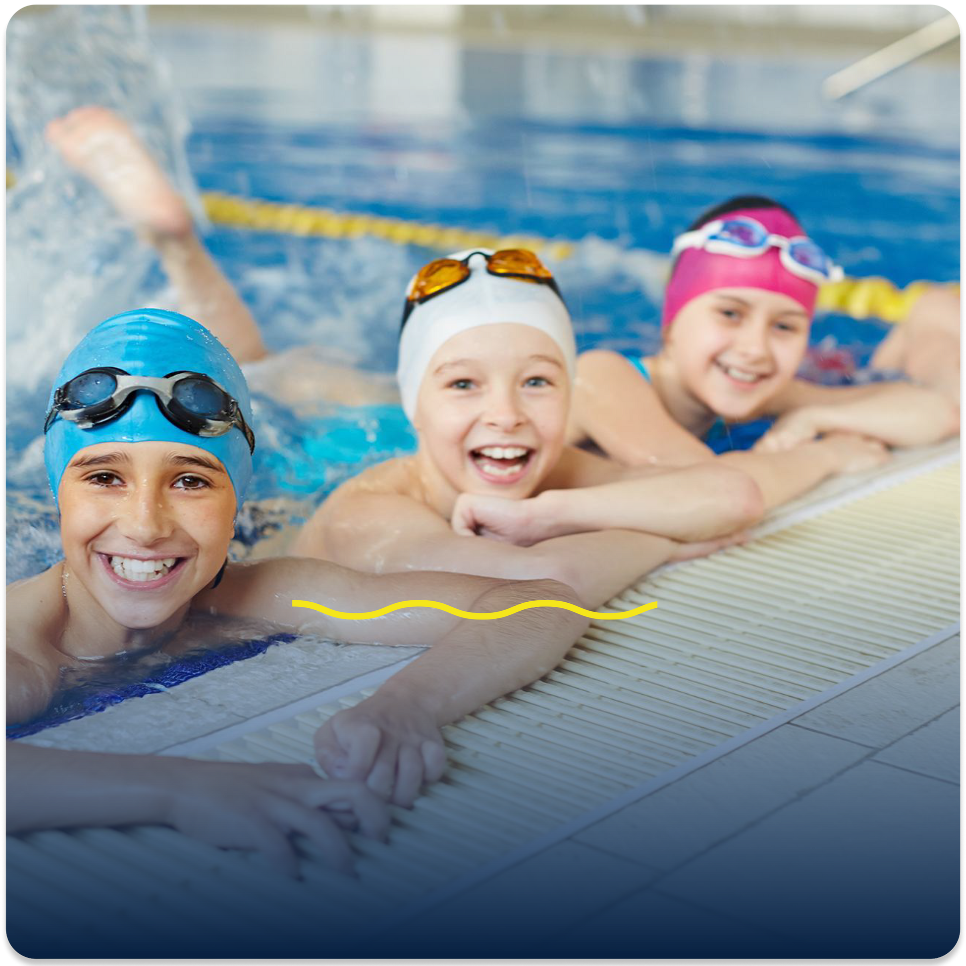 A group of children are smiling in a swimming pool