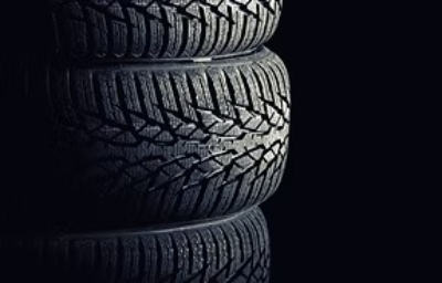 Our business owners sitting on motorbikes in the shop