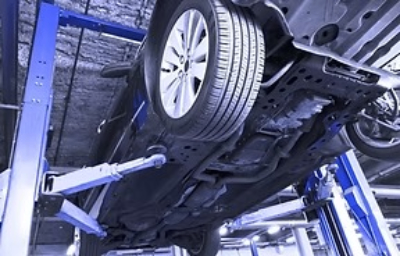 Our business owners sitting on motorbikes in the shop