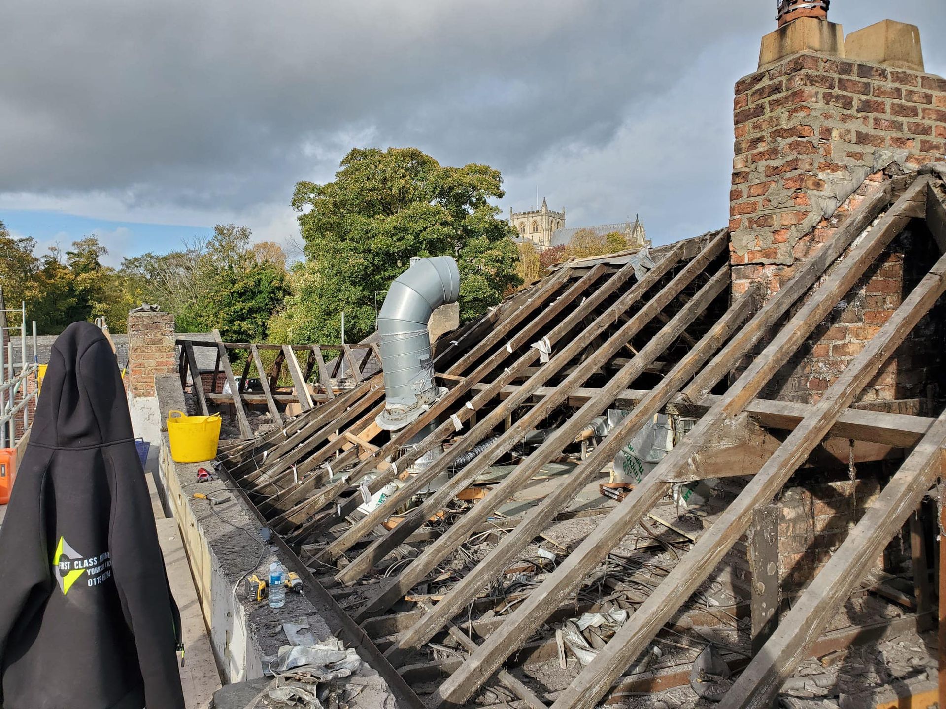 The roof of a building is being demolished.