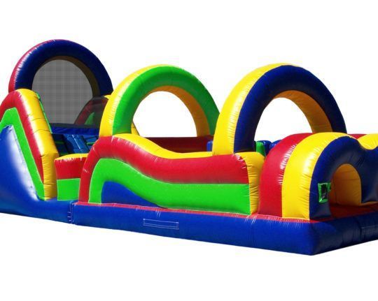 A colorful inflatable obstacle course with a white background