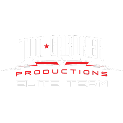 The logo for tom gardner productions elite team is white and red.