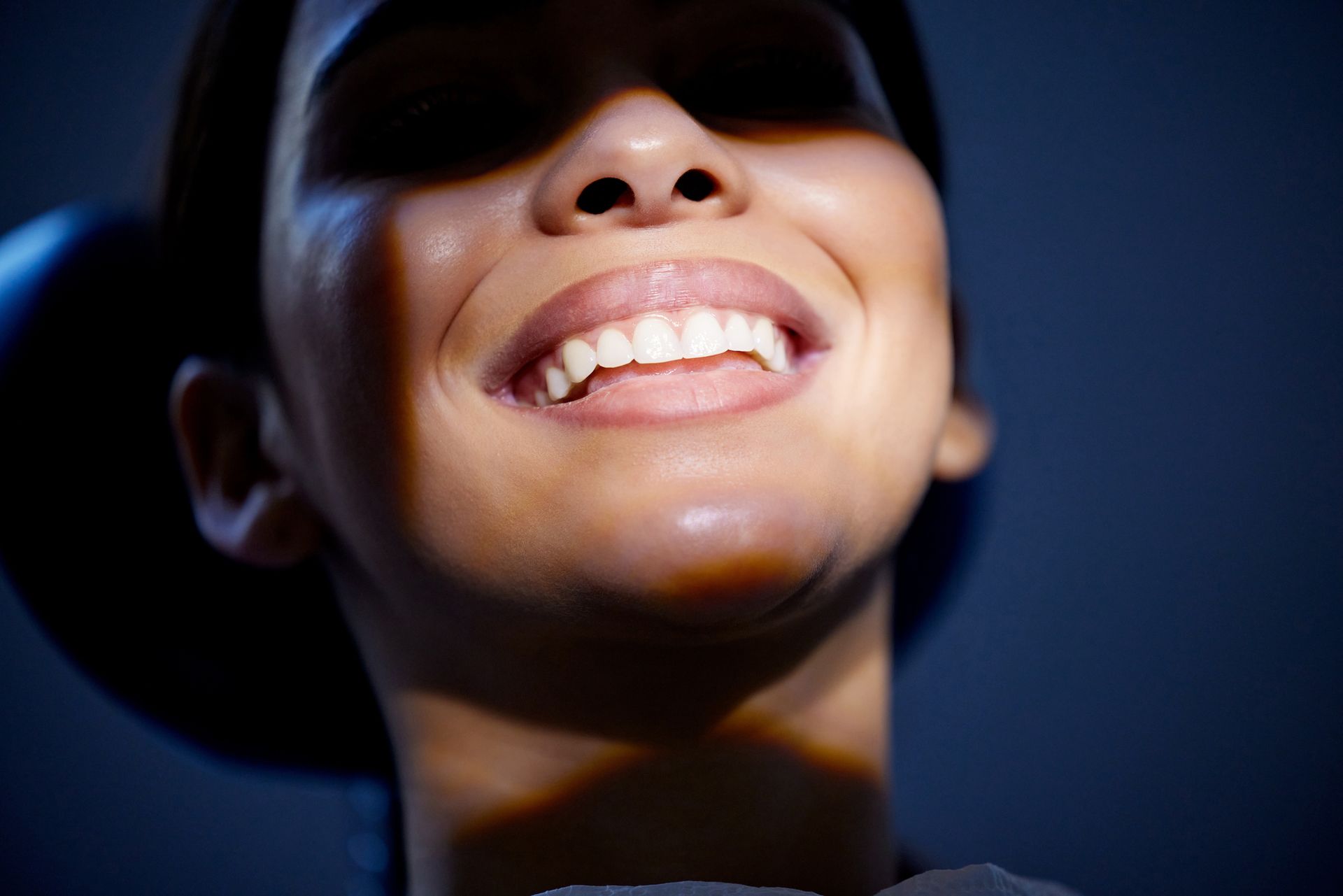 Shot of a young woman having a dental procedure performed on her