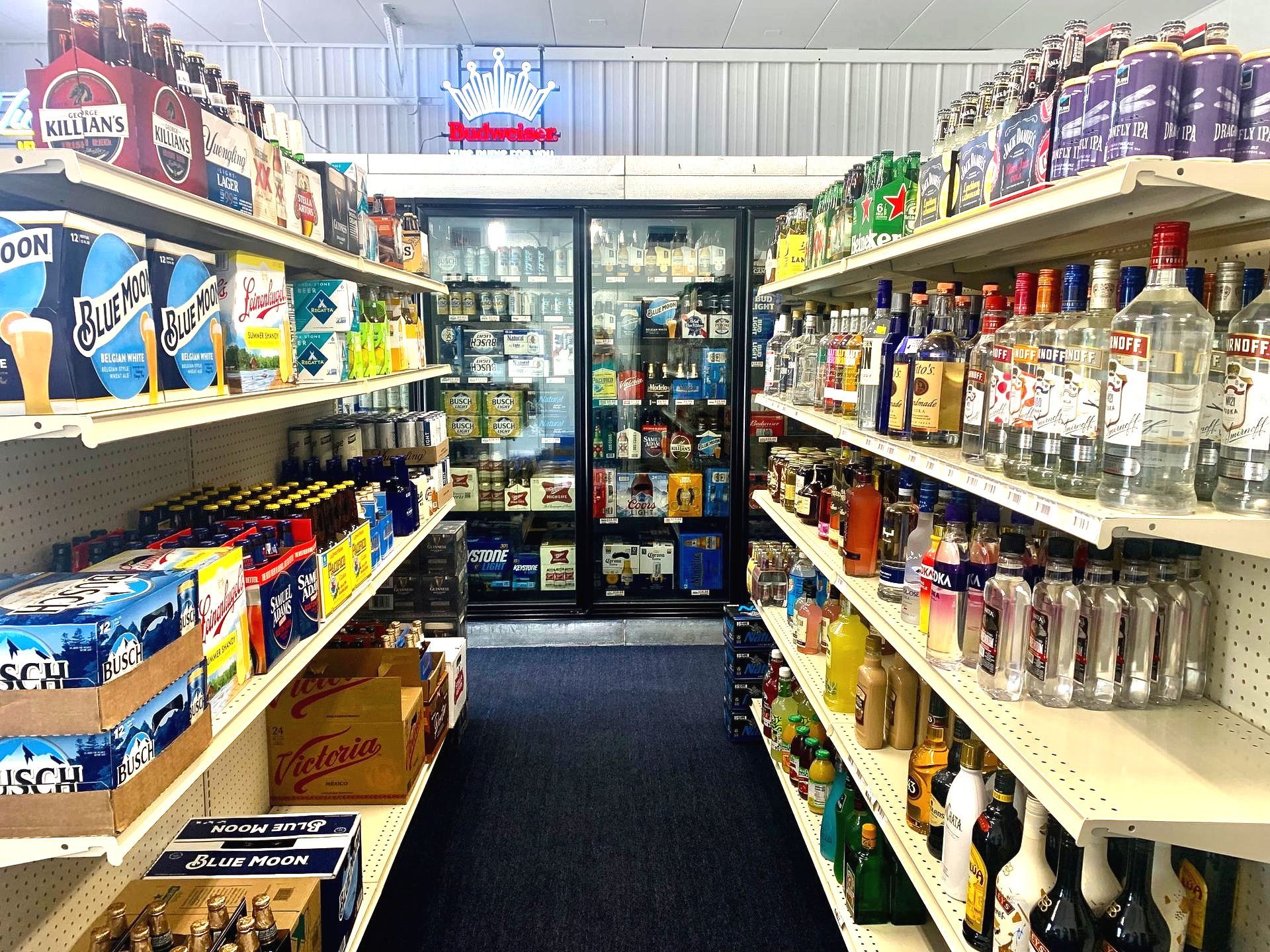 A liquor store filled with lots of beer and liquor