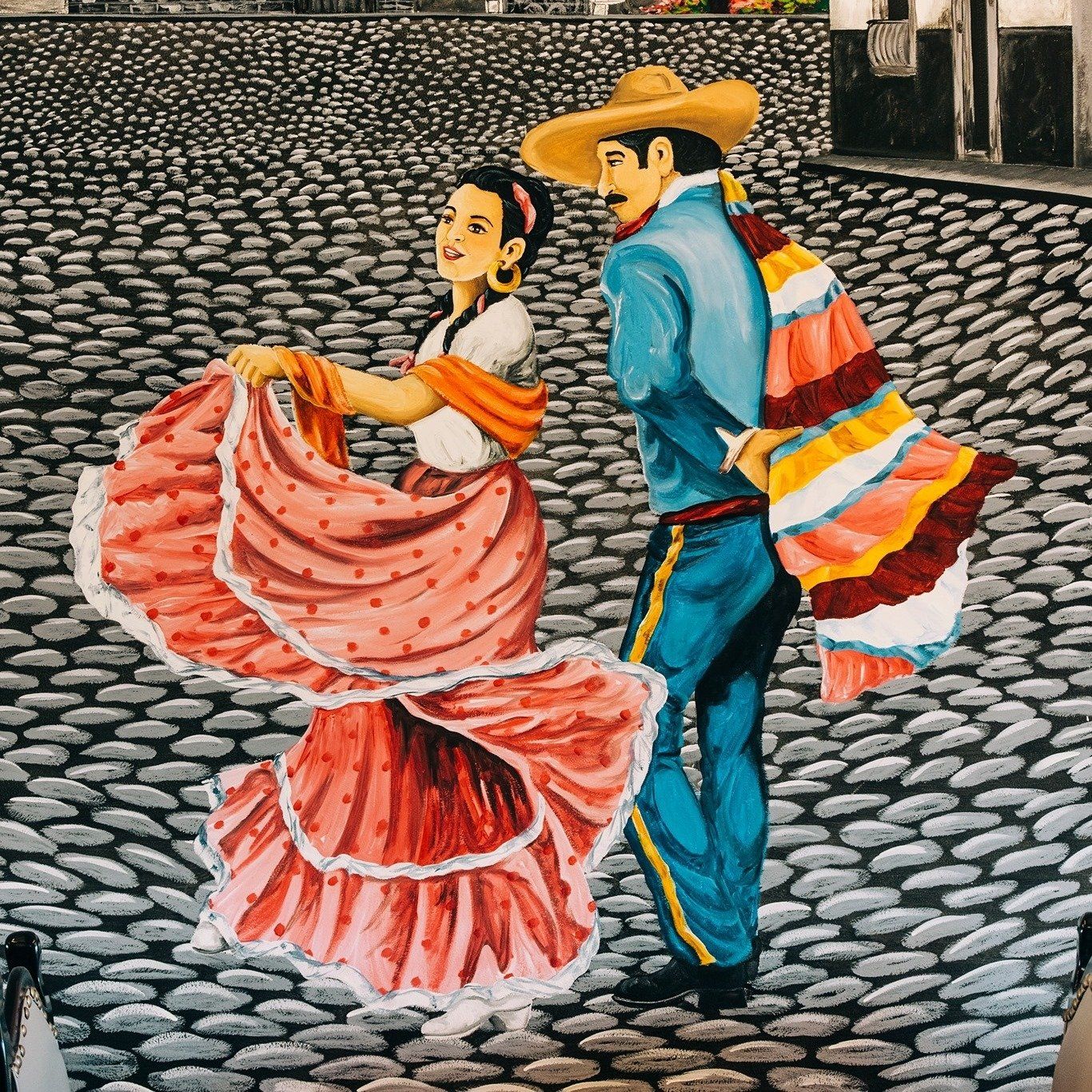 A painting of a man and woman dancing on a cobblestone street.