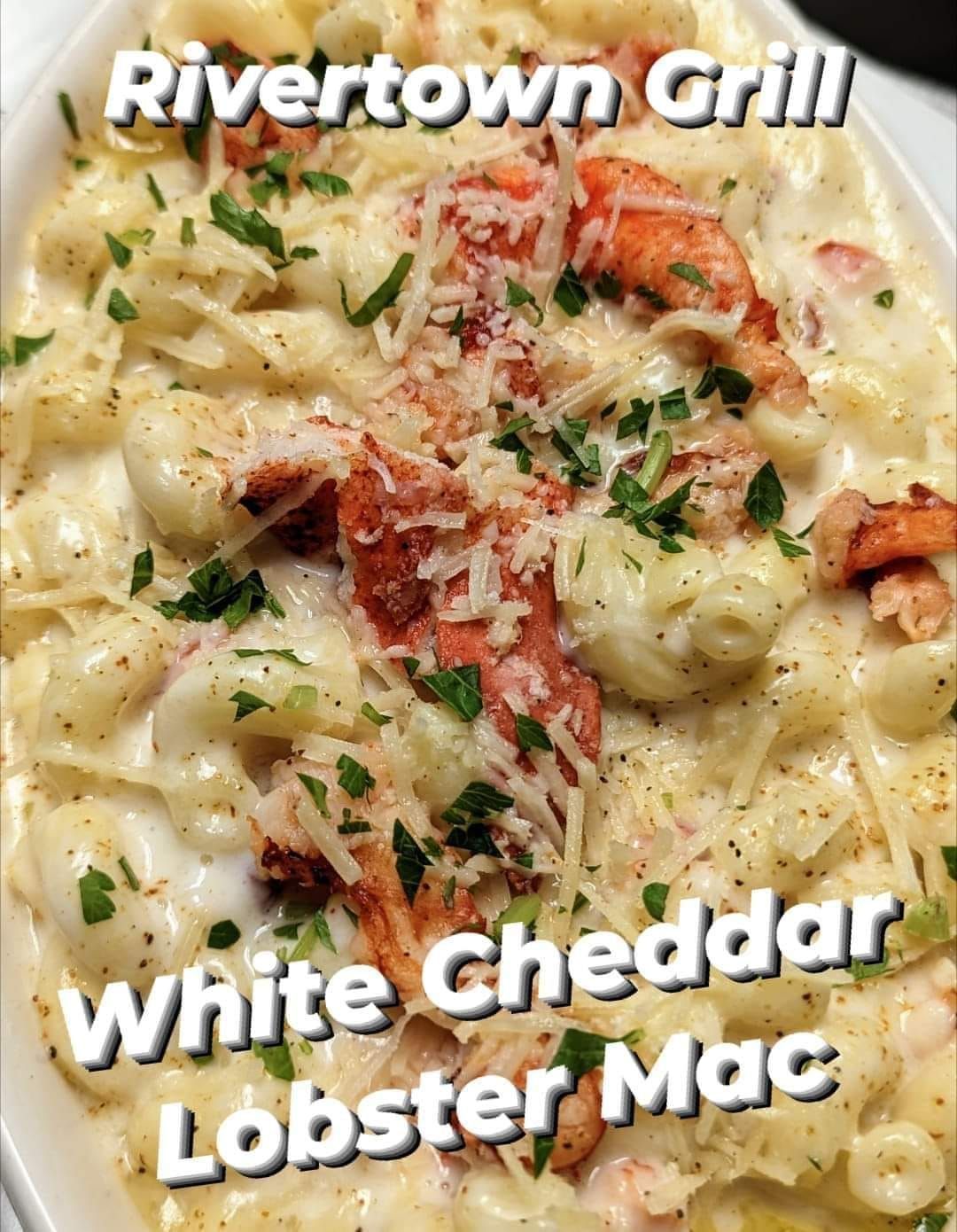 A close up of a white cheddar lobster mac casserole dish.