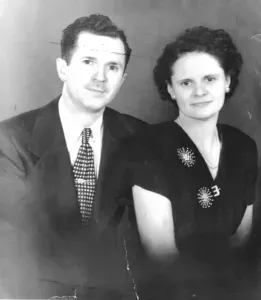 A child is playing a small guitar