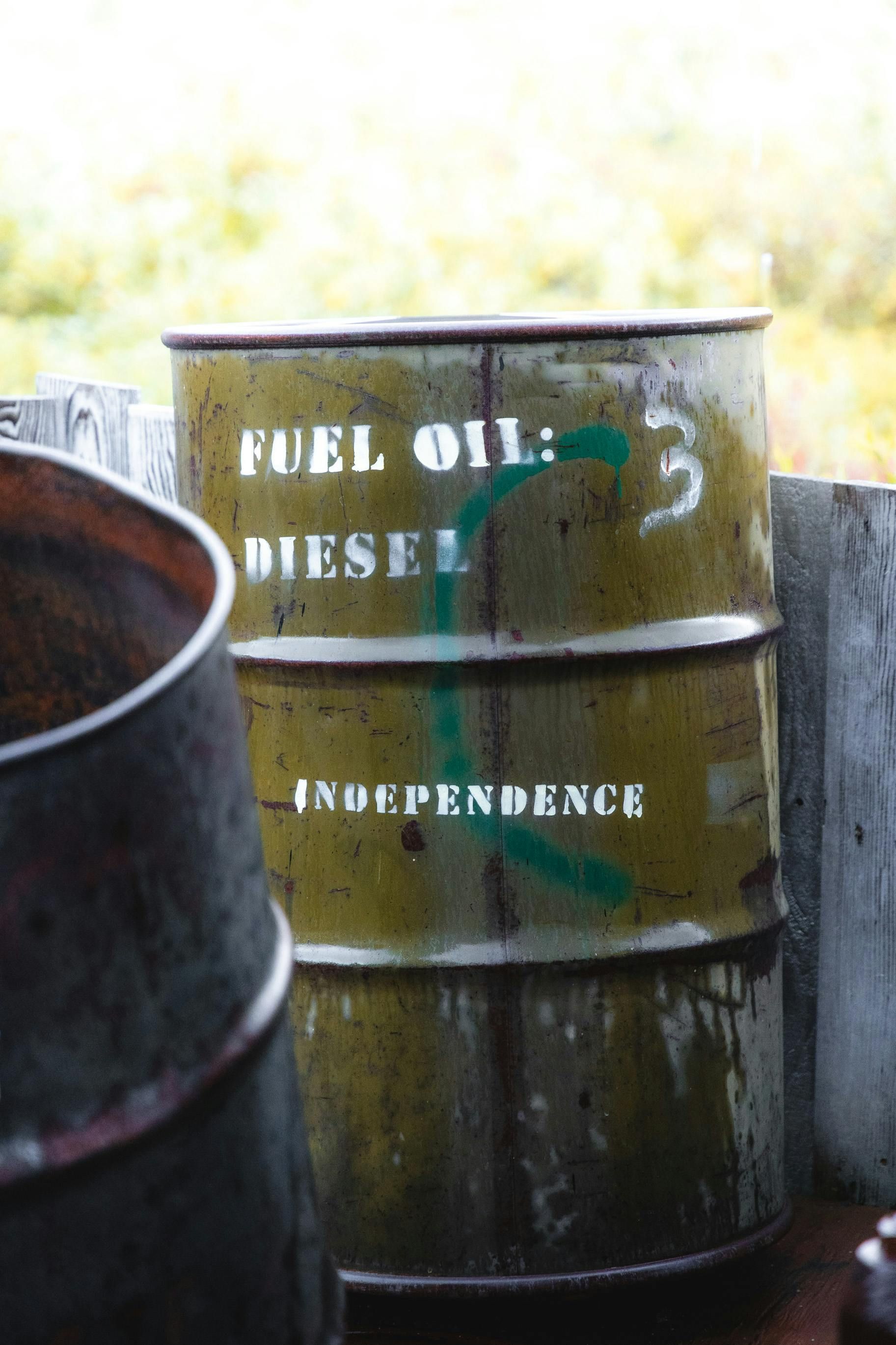 Three barrels of fuel oil are stacked on top of each other