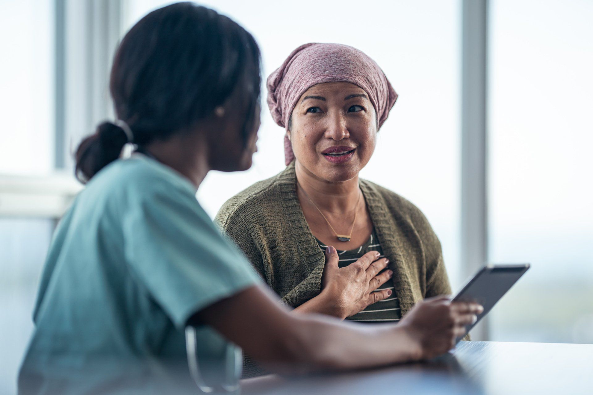 Nurse Having A Conversation To A Patient — Forest City, NC — Green Insurance