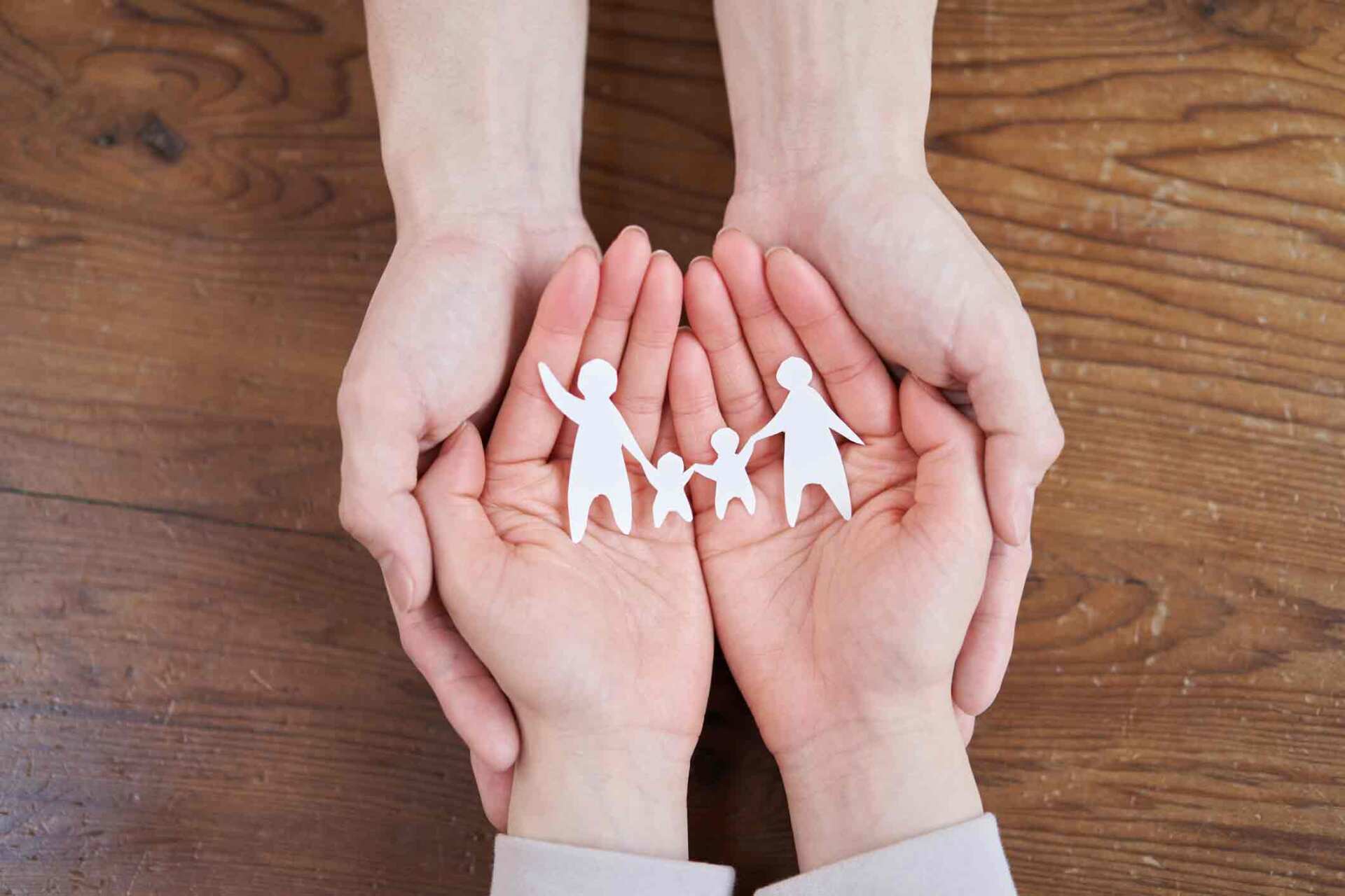 Paper Dolls In Hands — Forest City, NC — Green Insurance