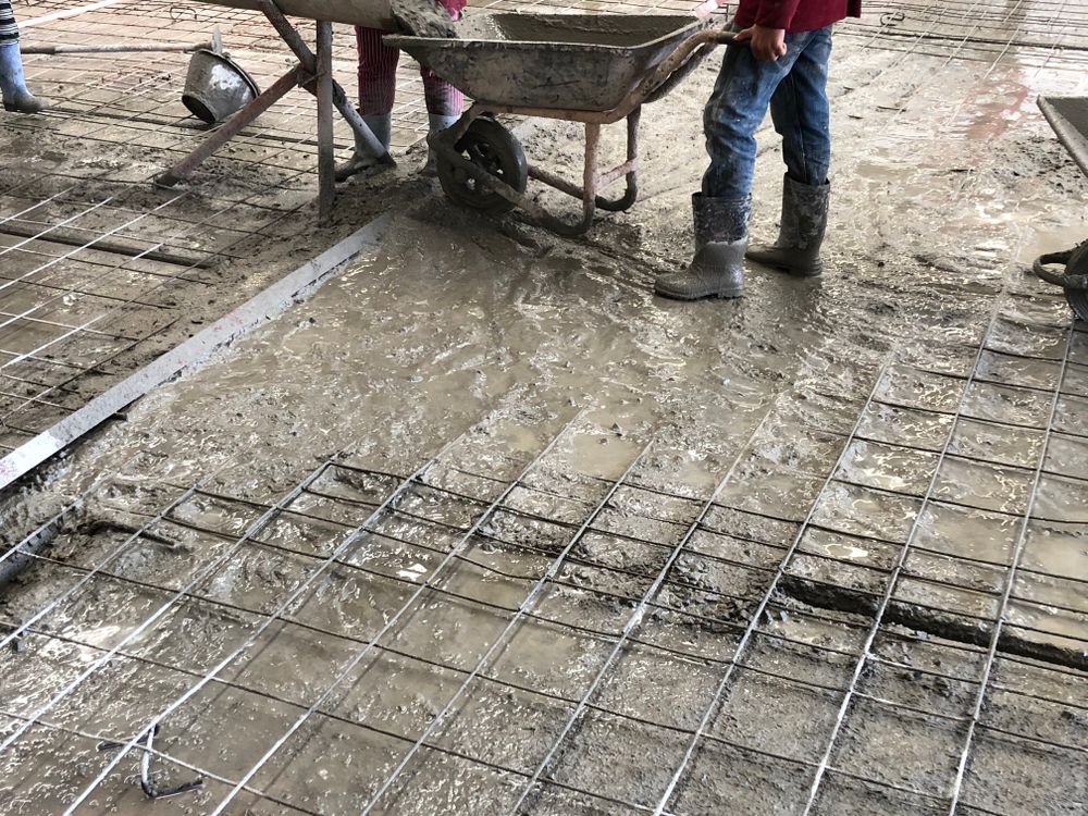 Construction Workers Pouring Concrete — Atherton Tableland Concreting in Yungaburra, QLD