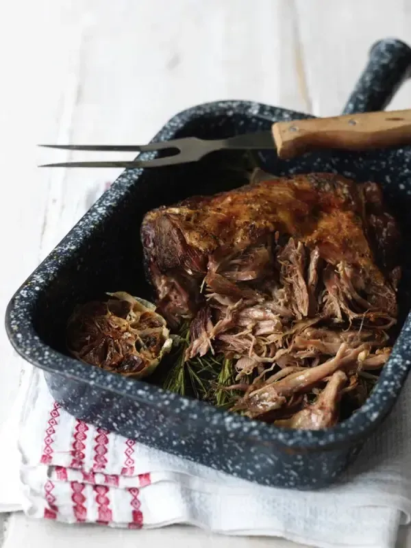 Classic Slow-roasted Shoulder of Lamb With Garden Herbs and Garlic