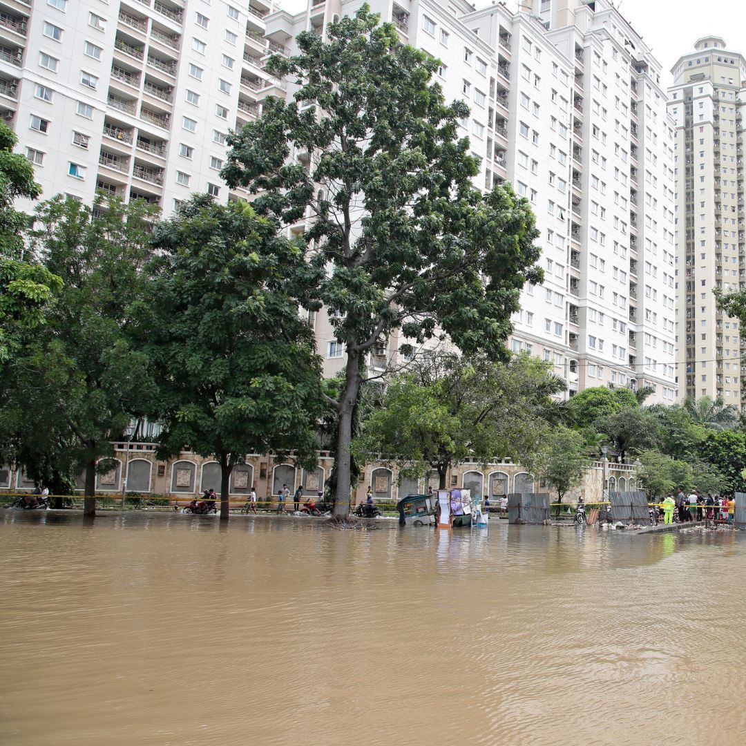 What role does flood insurance play for condo associations, and when is it required?