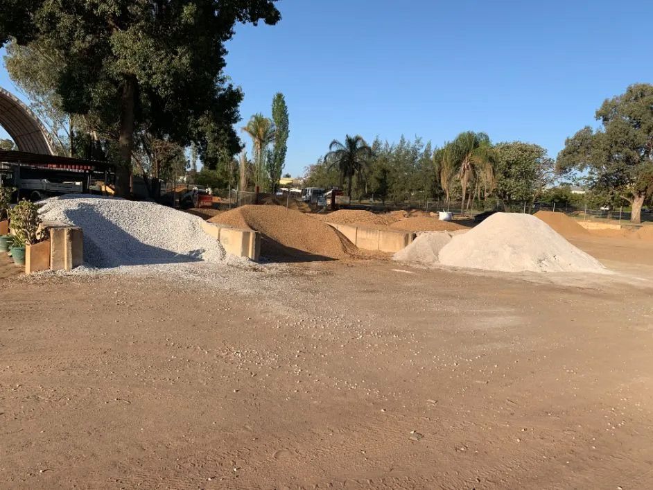 Different Verities of Soil and Sand Dumped on a Ground — Dubbo Soils & Landscaping Supplies in Dubbo, NSW