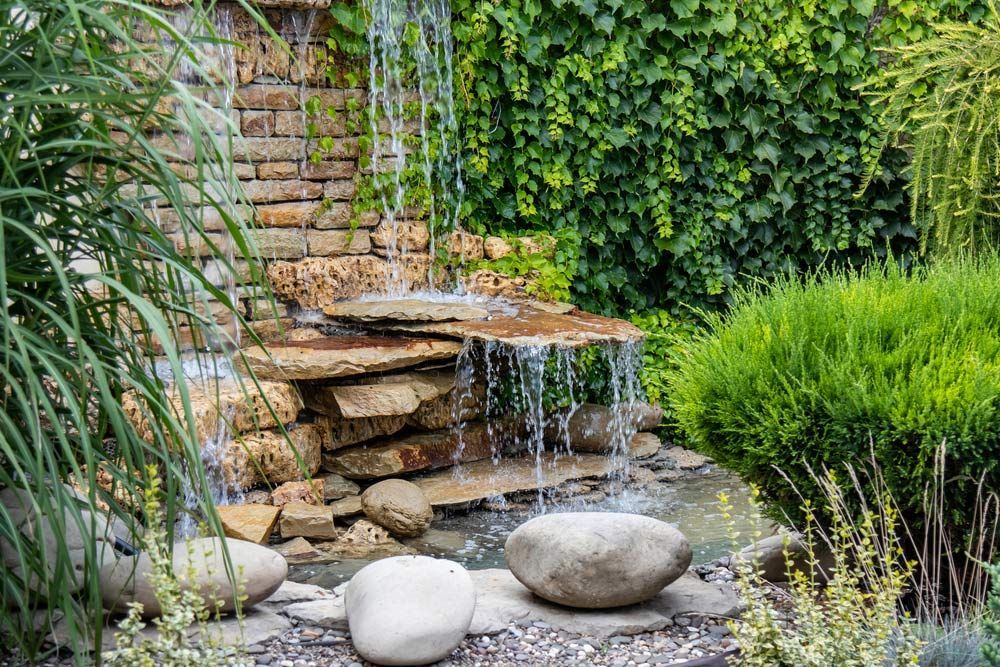 Decorative Stones Around Garden Waterfall