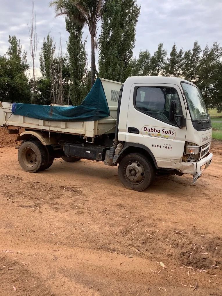 A Pile of Concrete Pavers Stacked on Top of Each Other — Dubbo Soils & Landscaping Supplies in Narromine, NSW