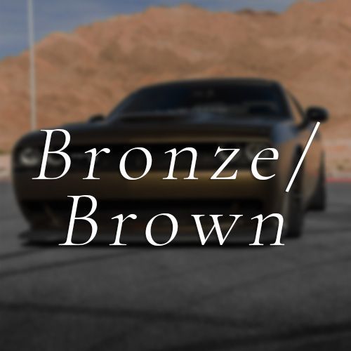 A picture of a car that says bronze brown