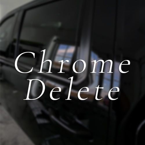 A black car with chrome delete written on it