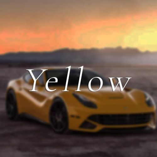 A yellow sports car is driving on a dirt road