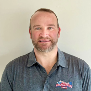 Man in gray polo shirt with 